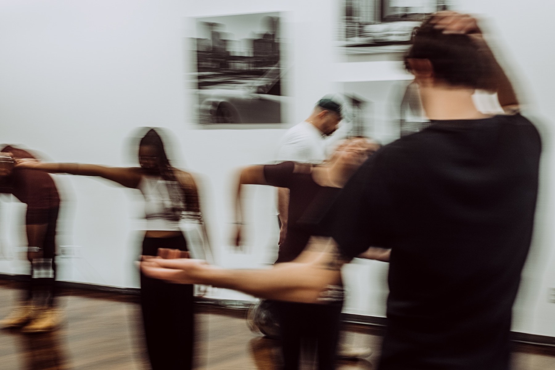 Actors extending their arms during a movement exercise